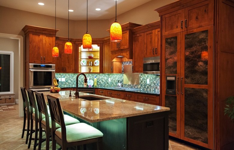 Eat-in Kitchen with custom cabinetry, granite countertops and Thermador appliances